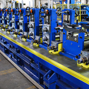 Liquidated tube mills and roll formers