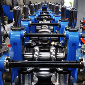Liquidated tube mills and roll formers